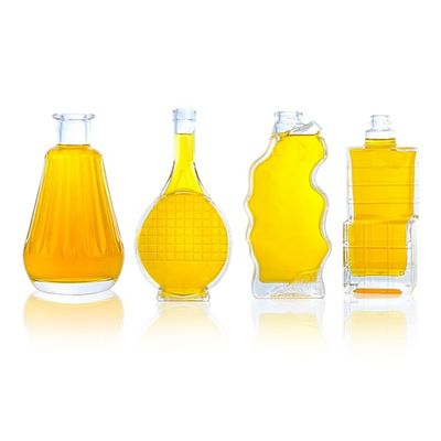 Productos de vidrio Botella de forma única 750 ml 700 ml para vodka whisky tequila brandy