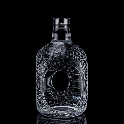 Vidrio redondo tallado 700ml 750ml Vodka Botella de vidrio Botella de vino con tipo de sellado de corcho