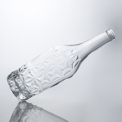 Forma personalizada 750 ml Impresión de seda cromada y pulida Vino espumoso Botella de vidrio de champán con etiquetas metálicas