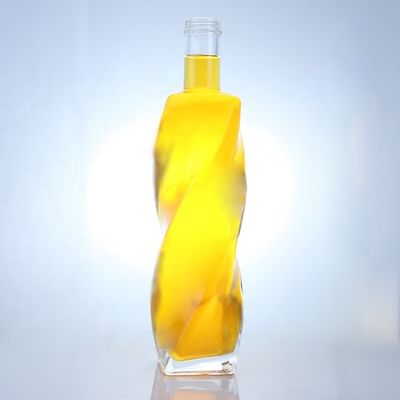 Logotipo personalizado Botella de vidrio especial de forma 700ml 750ml con tapa de tornillo