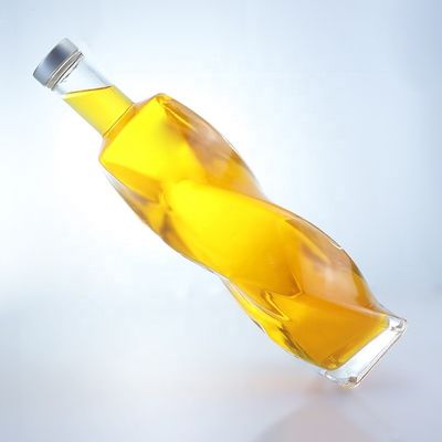 Logotipo personalizado Botella de vidrio especial de forma 700ml 750ml con tapa de tornillo