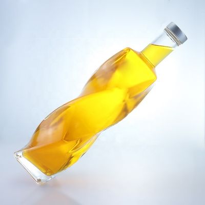 Logotipo personalizado Botella de vidrio especial de forma 700ml 750ml con tapa de tornillo
