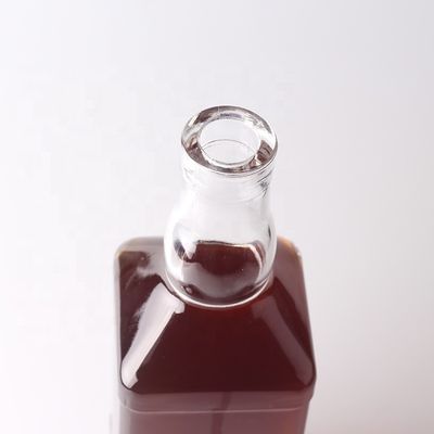 Material del cuello Vidrio 500 ml 700 ml Botella transparente en relieve para whisky ron ginebra brandy