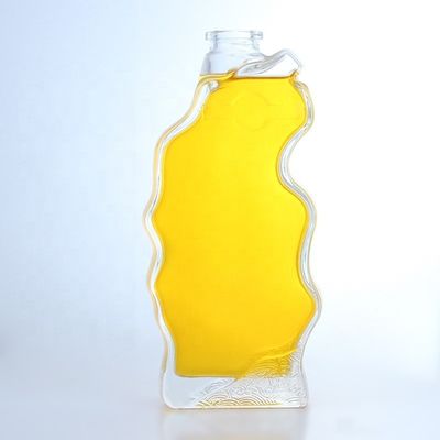 Productos de vidrio Botella de forma única 750 ml 700 ml para vodka whisky tequila brandy