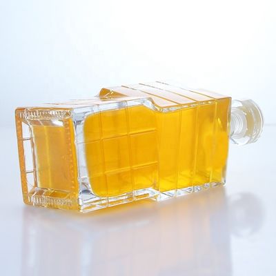 Productos de vidrio Botella de forma única 750 ml 700 ml para vodka whisky tequila brandy