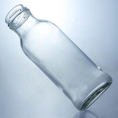 Botella de bebida de vidrio transparente Popular 100ml260ml 500ml 1000ml Botella redonda con tapa de tornillo