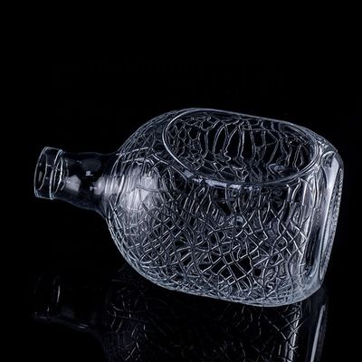 Vidrio redondo tallado 700ml 750ml Vodka Botella de vidrio Botella de vino con tipo de sellado de corcho