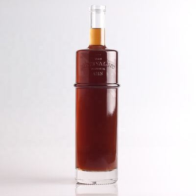 Botella de vidrio de tequila con grabado de 750 ml por litro con forma redonda y tipo de sellado de corcho
