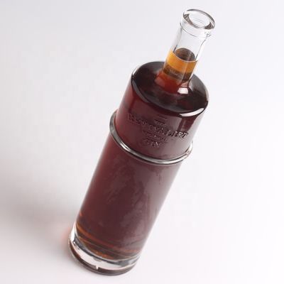 Botella de vidrio de tequila con grabado de 750 ml por litro con forma redonda y tipo de sellado de corcho