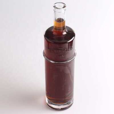 Botella de vidrio de tequila con grabado de 750 ml por litro con forma redonda y tipo de sellado de corcho