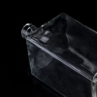 Impresión en pantalla Botella de vidrio transparente de 1000 ml para vodka de forma cuadrada con tapa de tornillo