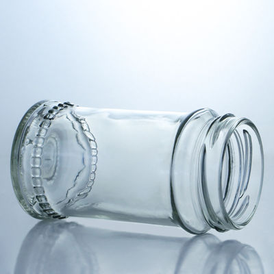 Contenedor de alimentos tapa metálica frascos de vidrio transparente de miel para almacenamiento de mermelada de miel personalizada