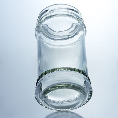 Contenedor de alimentos tapa metálica frascos de vidrio transparente de miel para almacenamiento de mermelada de miel personalizada
