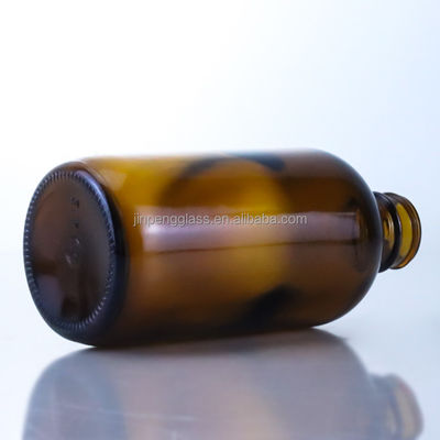 Botella de cerveza de vidrio vacía de 350 ml con pantalla de seda con tapa de corona y estampado en caliente Diseño único
