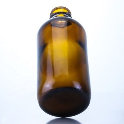 Botella de cerveza de vidrio vacía de 350 ml con pantalla de seda con tapa de corona y estampado en caliente Diseño único