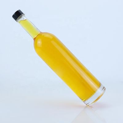 Logotipo personalizado 700ml 750ml botella de vidrio de forma redonda de piedra alta con acabado superior de tornillo