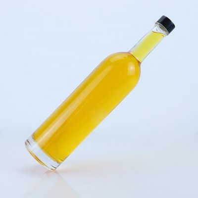 Logotipo personalizado 700ml 750ml botella de vidrio de forma redonda de piedra alta con acabado superior de tornillo