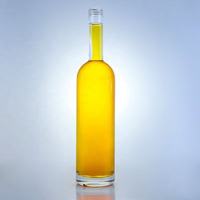 Logotipo personalizado 700ml 750ml botella de vidrio de forma redonda de piedra alta con acabado superior de tornillo