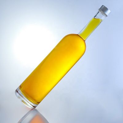 Logotipo personalizado 700ml 750ml botella de vidrio de forma redonda de piedra alta con acabado superior de tornillo