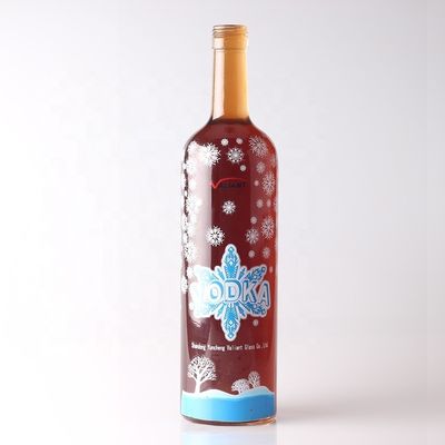 Botella de vodka de vidrio redonda de 750 ml con tapa de corcho y manejo de superficie personalizado