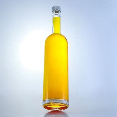 Logotipo personalizado 700ml 750ml botella de vidrio de forma redonda de piedra alta con acabado superior de tornillo