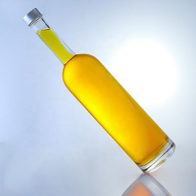Logotipo personalizado 700ml 750ml botella de vidrio de forma redonda de piedra alta con acabado superior de tornillo