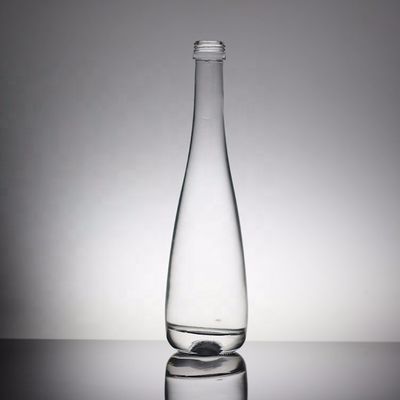 Botella de vidrio de agua mineral de 700 ml y 350 ml para bebidas industriales