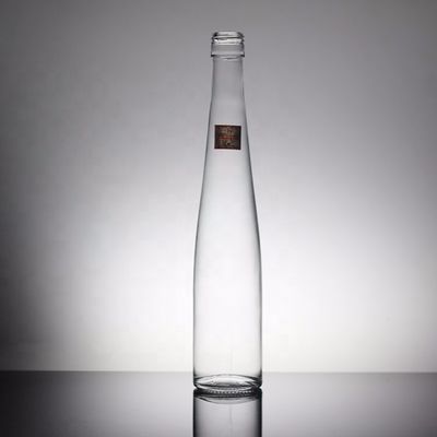 Botella de vidrio de agua mineral de 700 ml y 350 ml para bebidas industriales