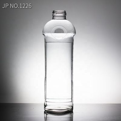 Botella de vidrio de agua mineral de 750 ml con tapa de tornillo tipo de sellado para agua bendita