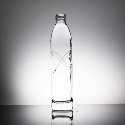 Botella de vidrio de agua mineral de 750 ml con tapa de tornillo tipo de sellado para agua bendita