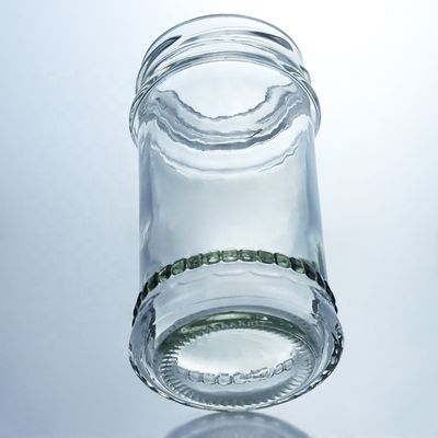 Diseño único 100ml 300ml 500ml Jarrón de vidrio de miel de campo con tapa Productos de vidrio transparente