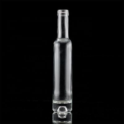 Botella de alcohol de vidrio transparente de 750 ml a granel con tapa metálica dorada