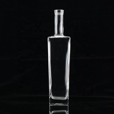 Botella de alcohol de vidrio transparente de 750 ml a granel con tapa metálica dorada