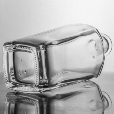 Botella de vidrio cuadrada única para whisky, vodka, tequila, ginebra, ron, sellador, corcho incluido