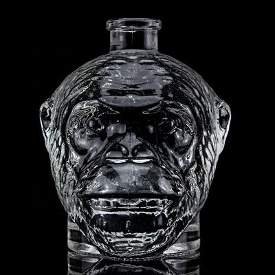 Diseño único 500ml 750ml Botella de vidrio en forma de cabeza de mono para vodka Liquor con corcho