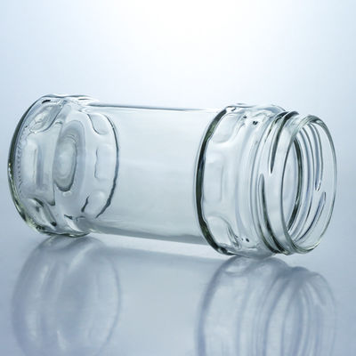 Producido Grado alimenticio cristal redondo claro jar de miel con tapa de tornillo para sus necesidades únicas