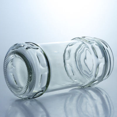 Producido Grado alimenticio cristal redondo claro jar de miel con tapa de tornillo para sus necesidades únicas