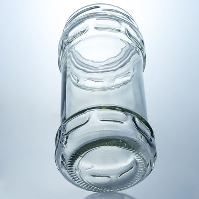 Producido Grado alimenticio cristal redondo claro jar de miel con tapa de tornillo para sus necesidades únicas