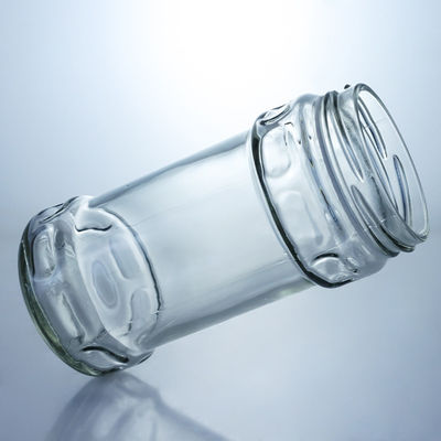 Producido Grado alimenticio cristal redondo claro jar de miel con tapa de tornillo para sus necesidades únicas
