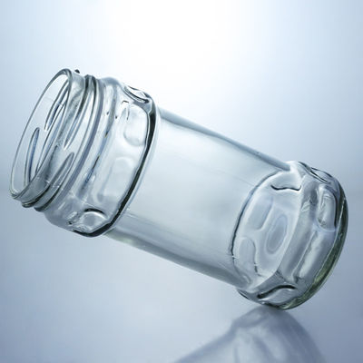 Producido Grado alimenticio cristal redondo claro jar de miel con tapa de tornillo para sus necesidades únicas
