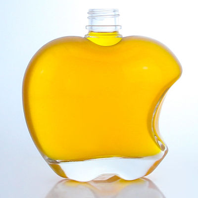 Botella de vidrio en forma de manzana con tapa personalizada para vodka y tequila whisky en vidrio de piedra