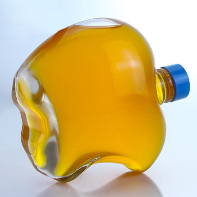 Botella de vidrio en forma de manzana con tapa personalizada para vodka y tequila whisky en vidrio de piedra