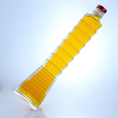 Botella de vidrio en forma de torre para vodka brandy tequila logotipo personalizado