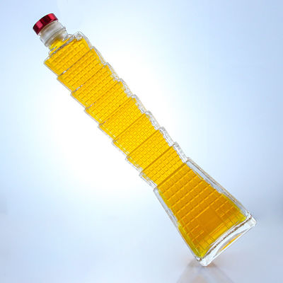 Botella de vidrio en forma de torre para vodka brandy tequila logotipo personalizado