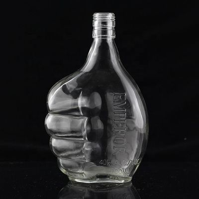 Botella de vidrio industrial de 700 ml para la industria de bebidas en forma de pulgar