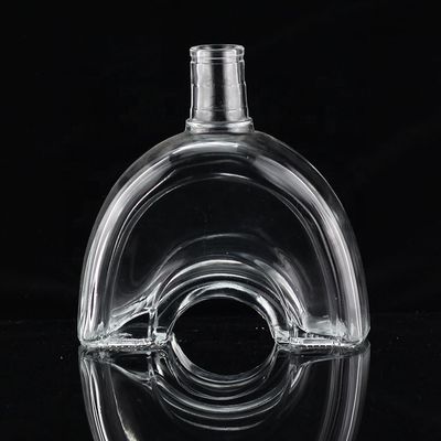 Botella de vidrio industrial de 700 ml para la industria de bebidas en forma de pulgar