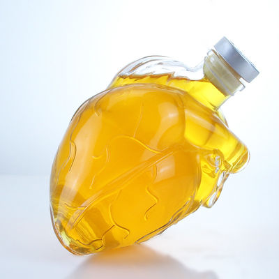 Botella de licor de vidrio en forma de corazón clara o personalizada para bebidas whisky vodka brandy