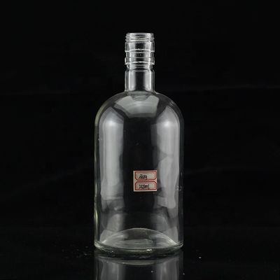 Botella de vidrio industrial de 700 ml para la industria de bebidas en forma de pulgar