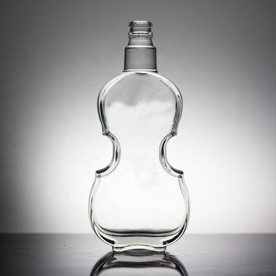 Material base Botella de vidrio con forma de letra única y tapa de corcho
