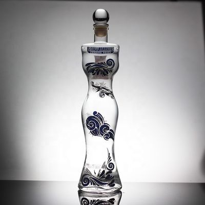 Material base Botella de vidrio con forma de letra única y tapa de corcho